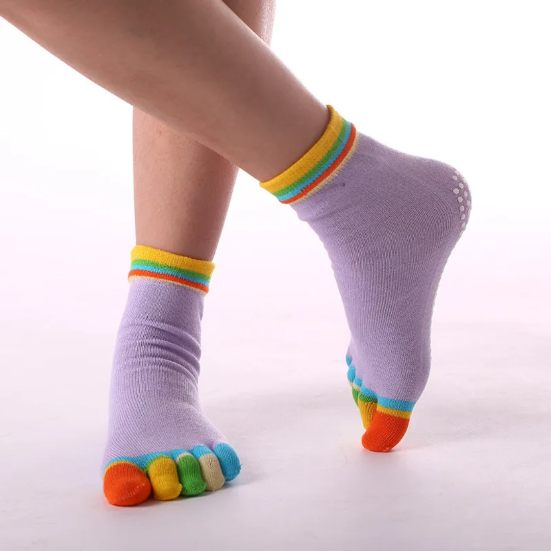 a woman's legs with colorful socks and socks