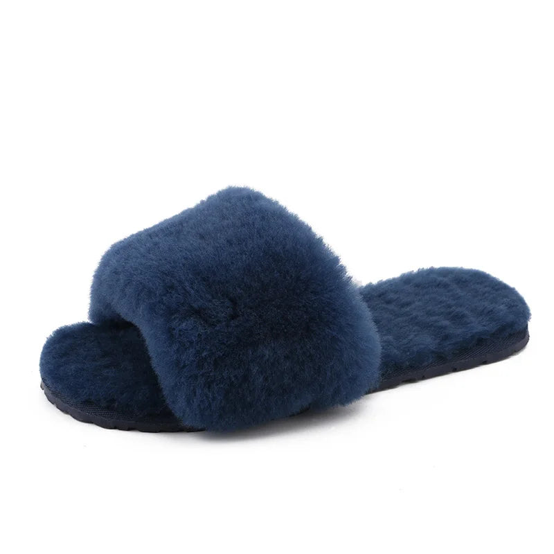 a pair of blue slippers on a white background