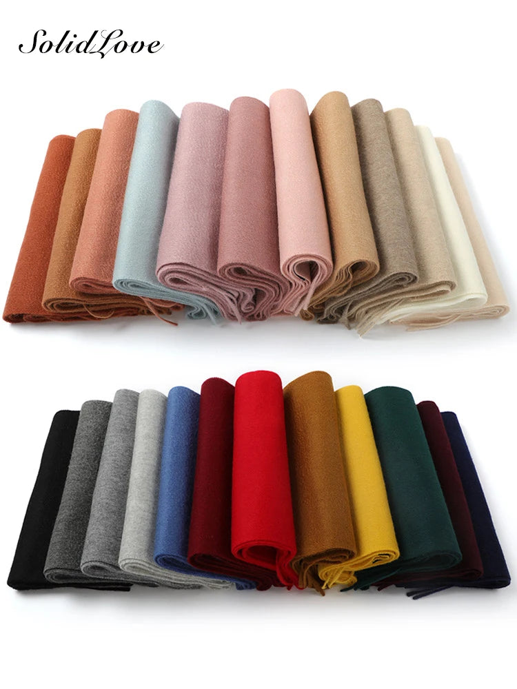 a bunch of different colors of fabric on a white background