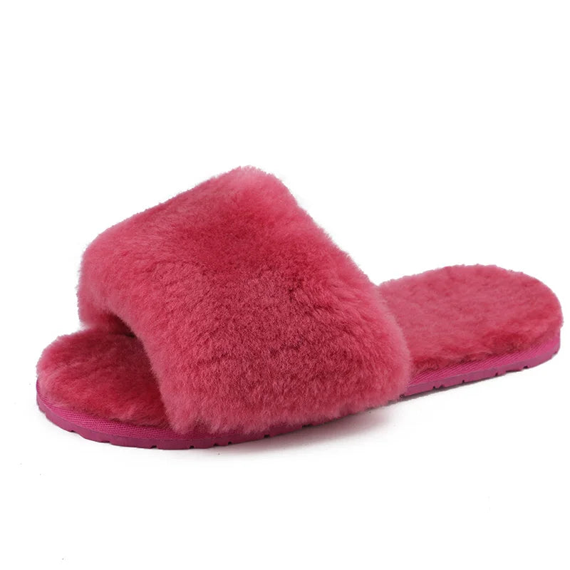 a pair of pink slippers on a white background