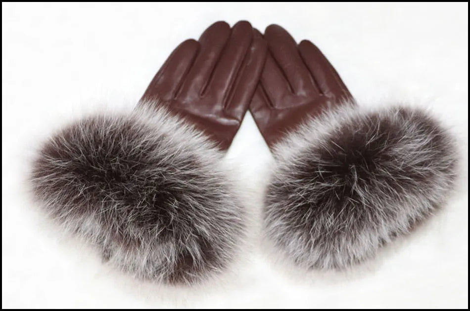 a pair of gloves with fur on them