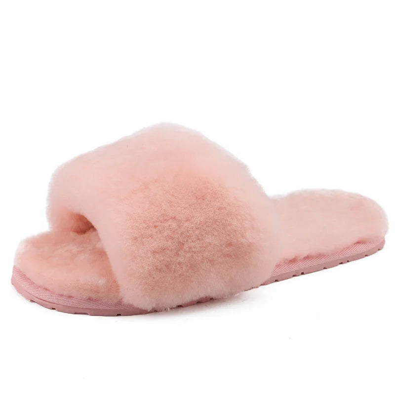 a pair of pink slippers on a white background