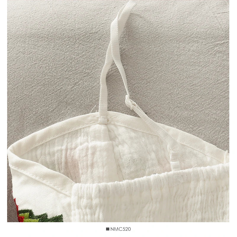 a close up of a white bag hanging on a wall
