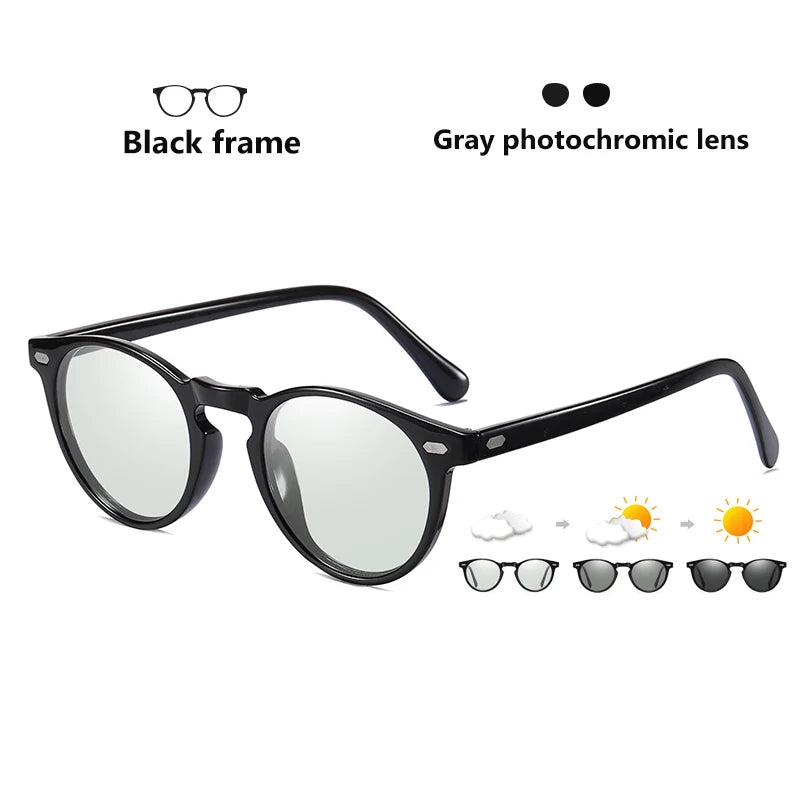 a pair of glasses with a black frame and gray photochromic lens