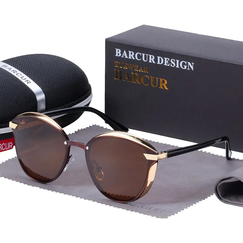 a pair of sunglasses sitting next to a box