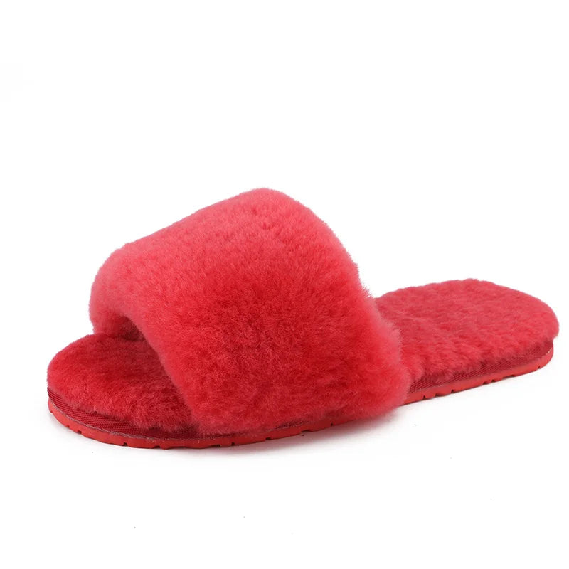 a pair of red slippers on a white background