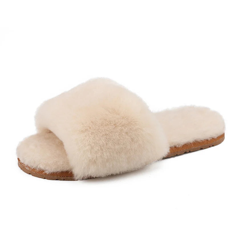 a pair of white slippers with fur on them