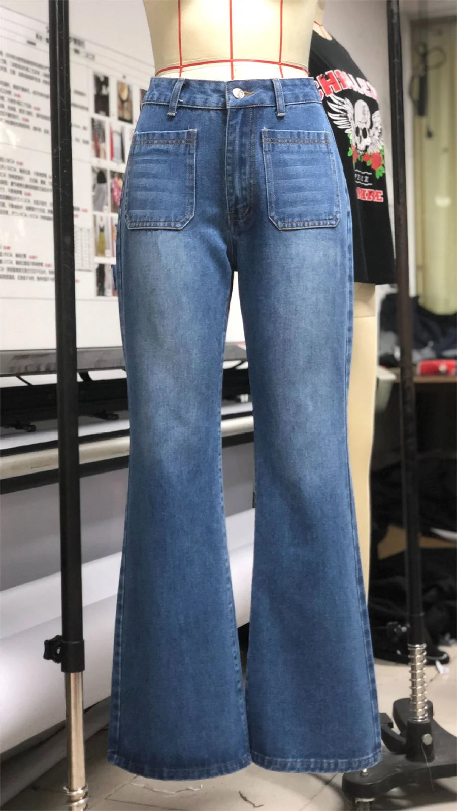 a mannequin wearing a pair of blue jeans