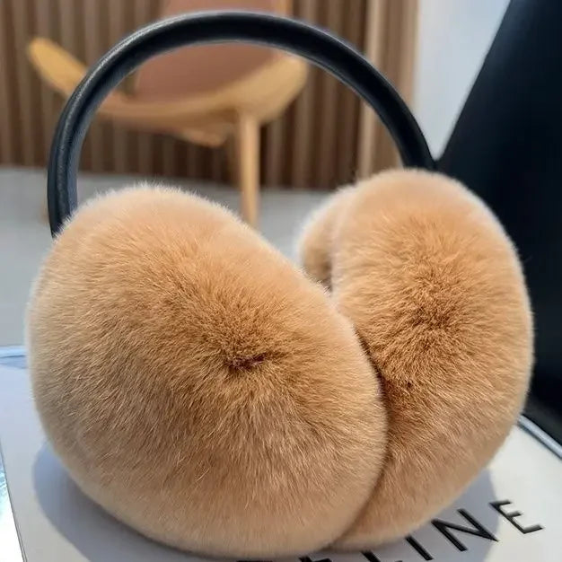 a pair of ear muffs sitting on top of a table