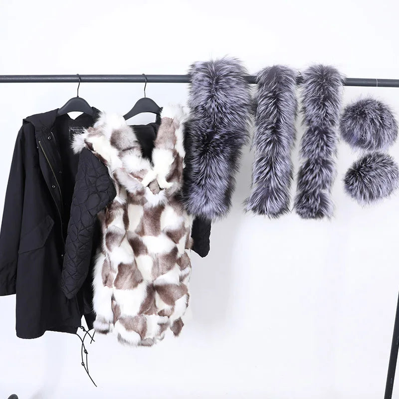 a coat rack with coats hanging on it