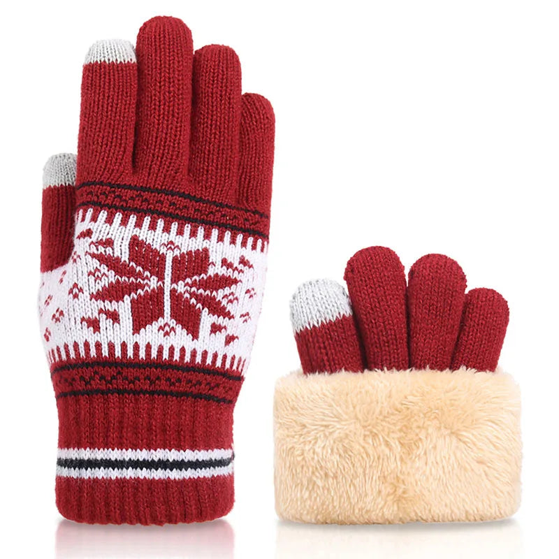 a pair of red and white knitted gloves