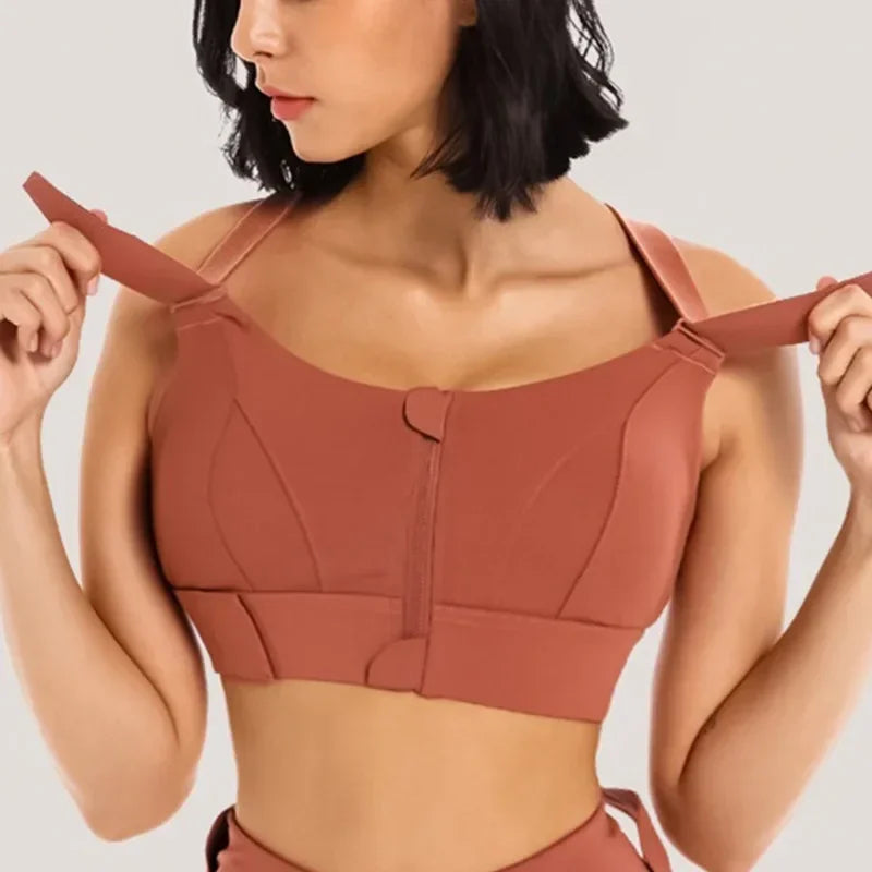 a woman wearing a crop top and tie around her waist