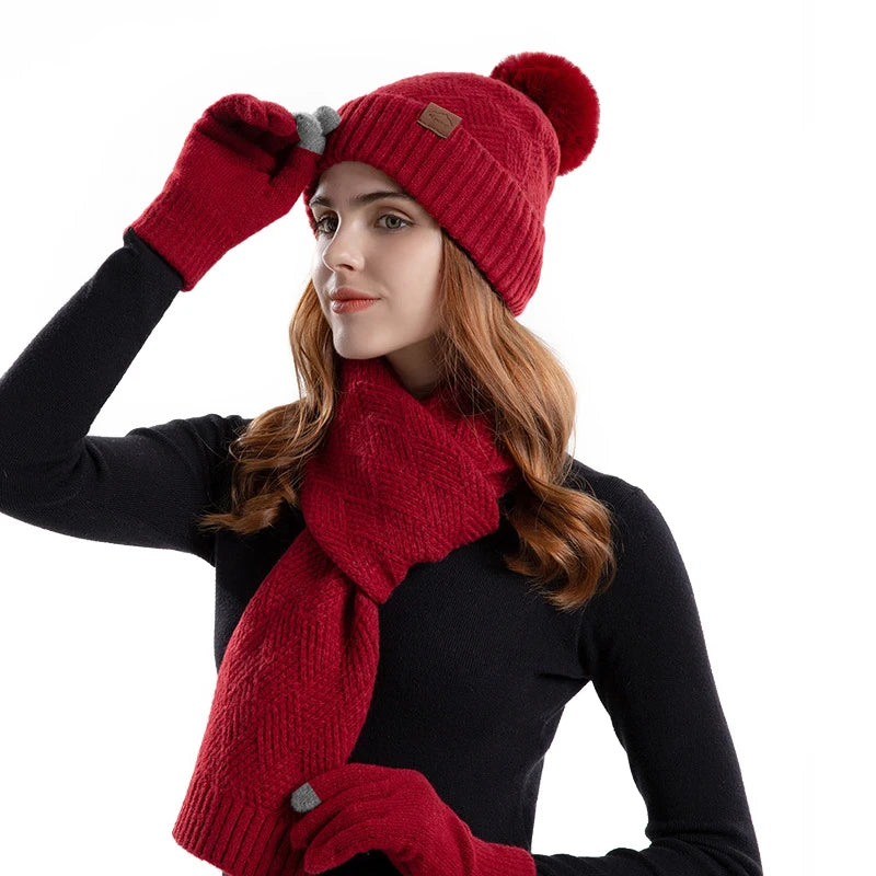 a woman wearing a red hat and scarf