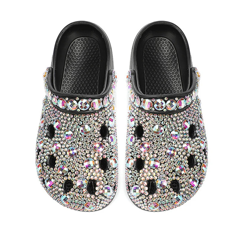 a pair of shoes with lots of crystals on them
