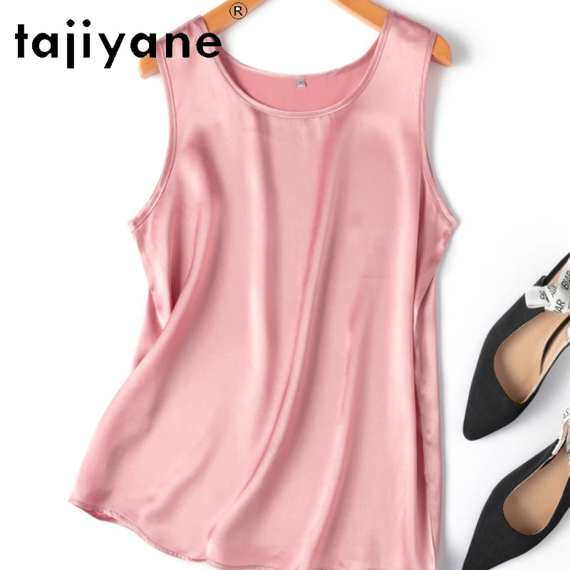 a pair of shoes and a pink top on a hanger