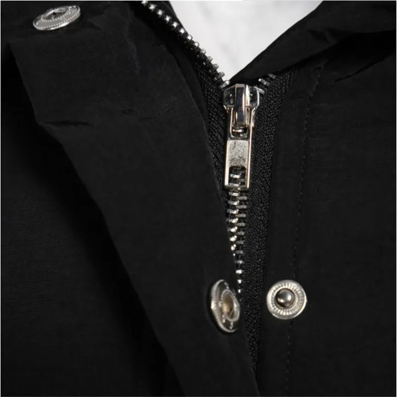 a close up of a zipper on a black jacket