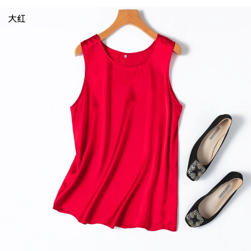 a pair of shoes and a red top on a hanger