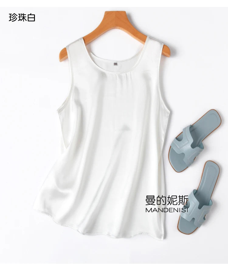 a women's tank top with a pair of shoes next to it