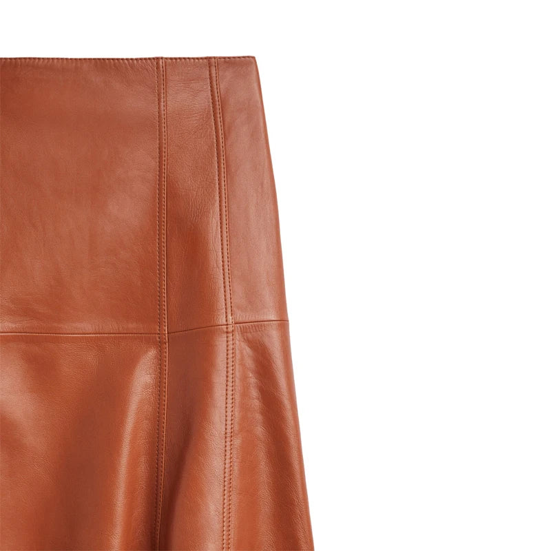 a brown leather skirt on a white background