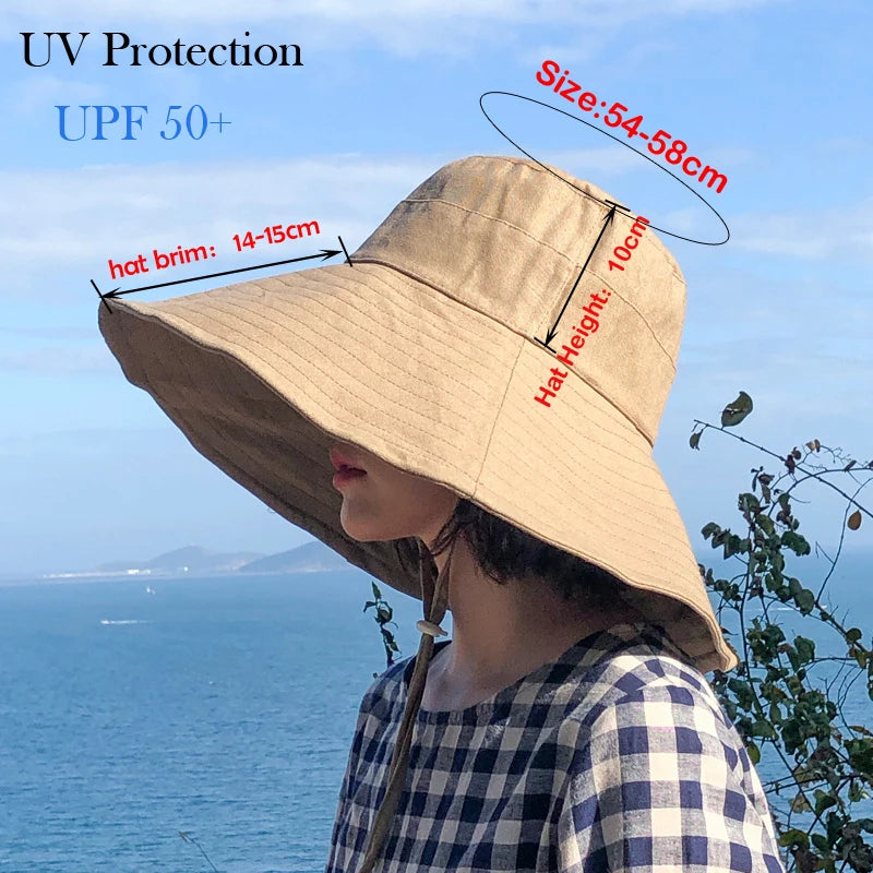 a woman wearing a floppy hat with the words u v protection upf 50 +