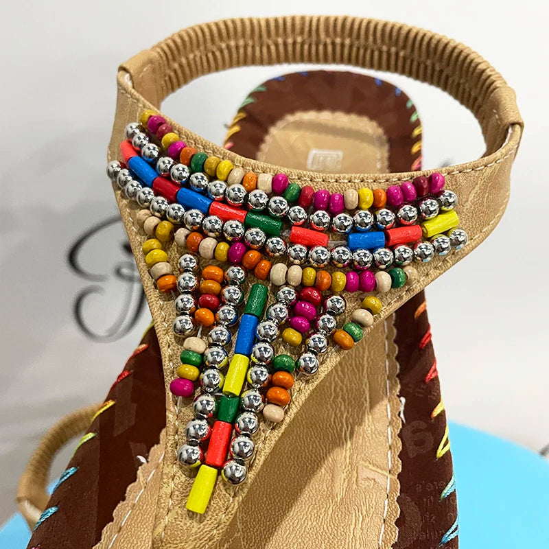 a close up of a pair of colorful sandals
