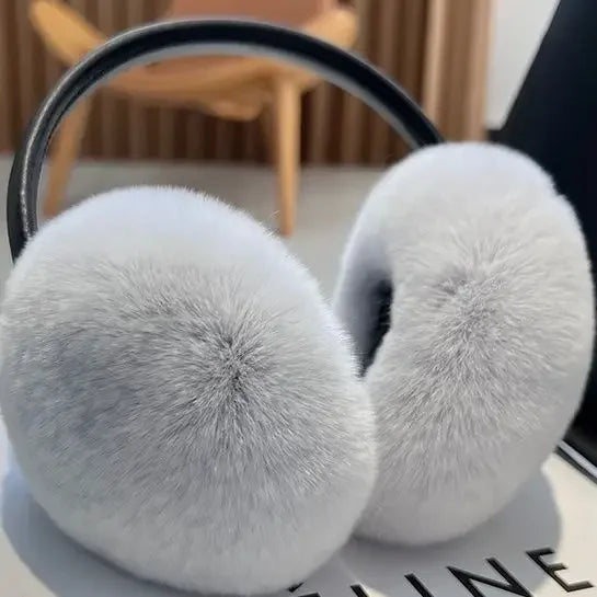 a pair of headphones sitting on top of a table