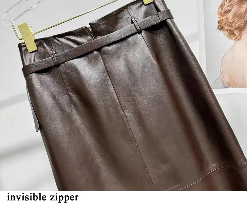 a brown leather skirt hanging on a rack