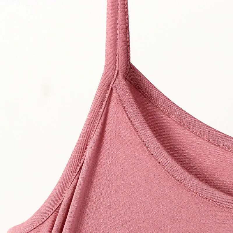 a close up of a pink shirt on a hanger