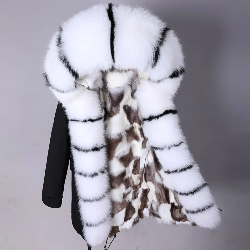 a white and brown fur vest on a mannequin