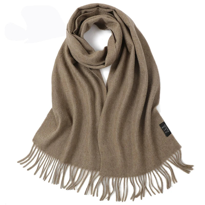 a tan scarf with fringes on a white background