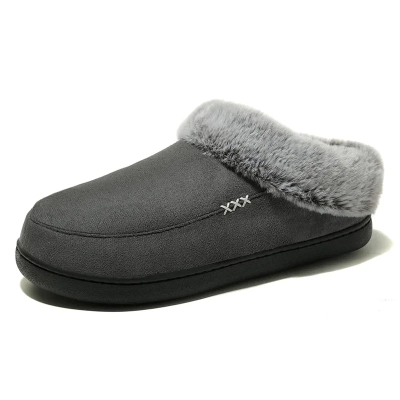 a pair of slippers with a fur lined bottom