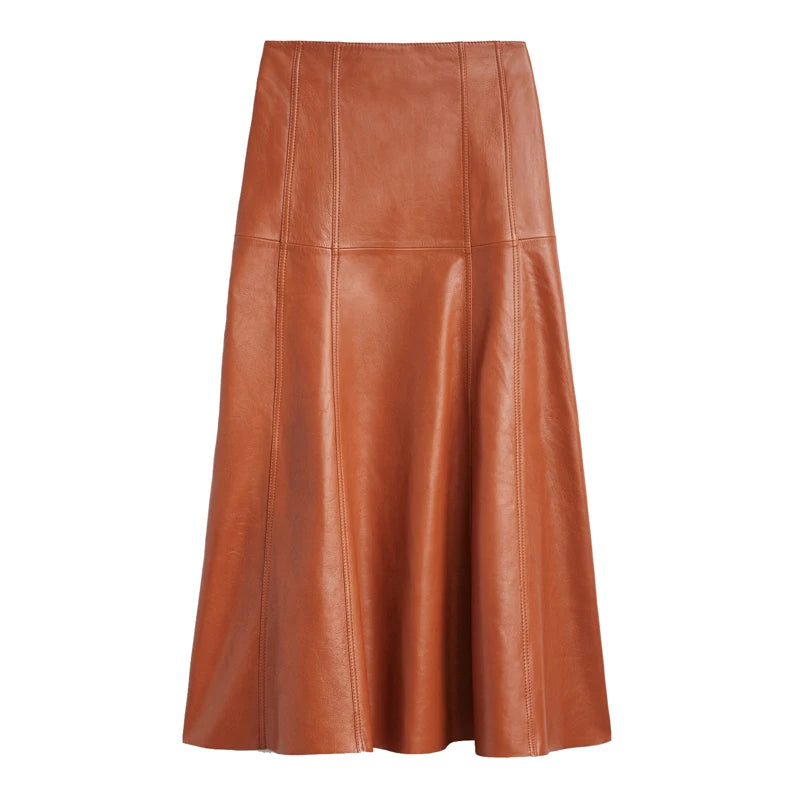 a woman wearing a brown leather skirt