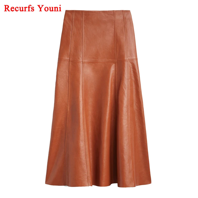 a woman wearing a brown leather skirt