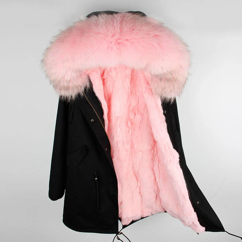 a black coat with a pink fur collar