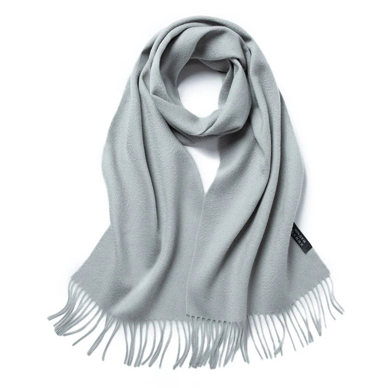 a light gray scarf with fringes on a white background