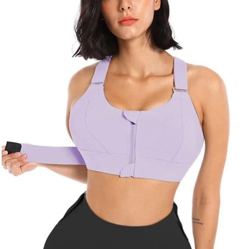 a woman wearing a purple sports bra top