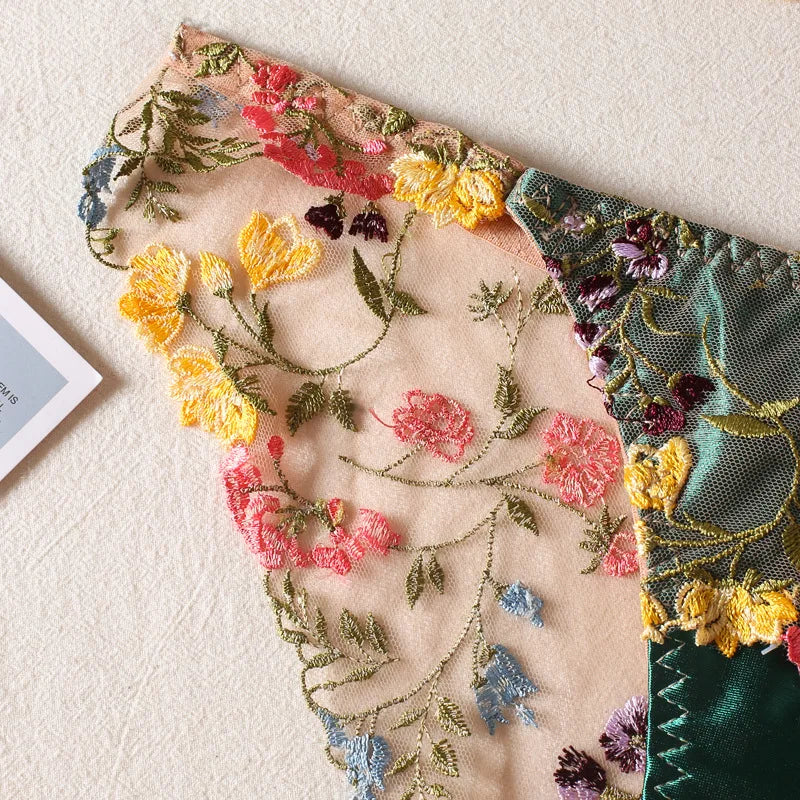 a close up of a piece of cloth with flowers on it