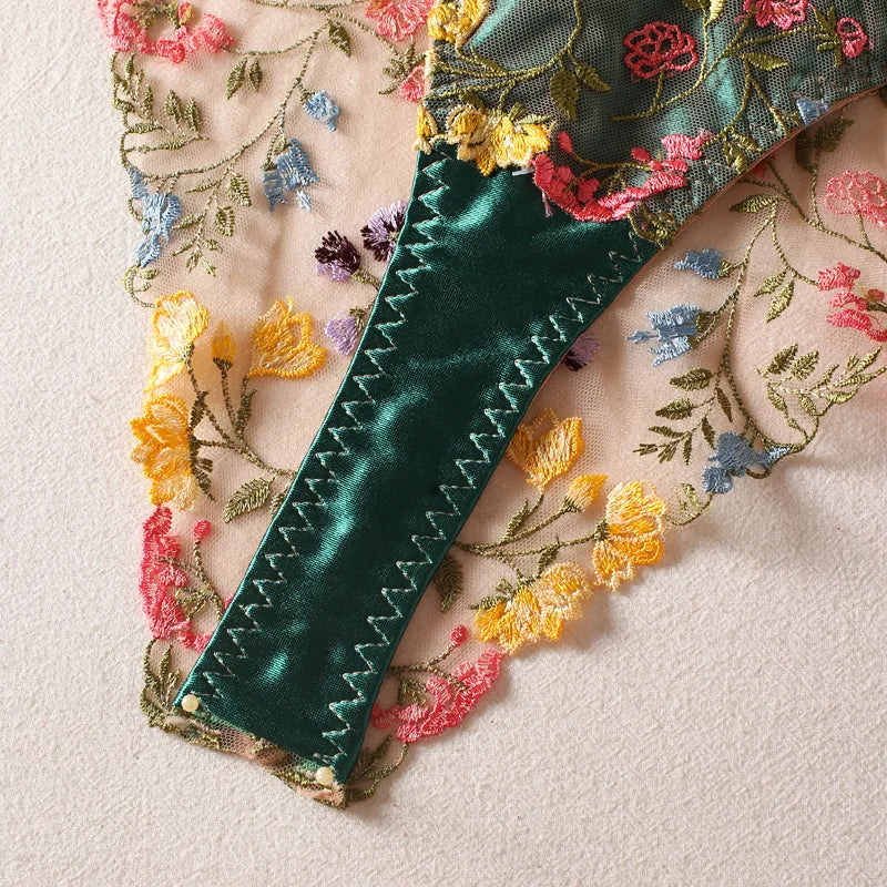 a close up of a piece of cloth with flowers on it