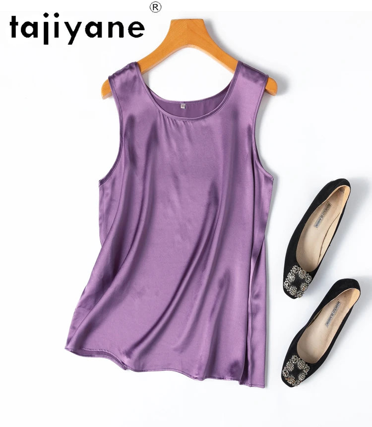 a pair of shoes and a purple top on a hanger