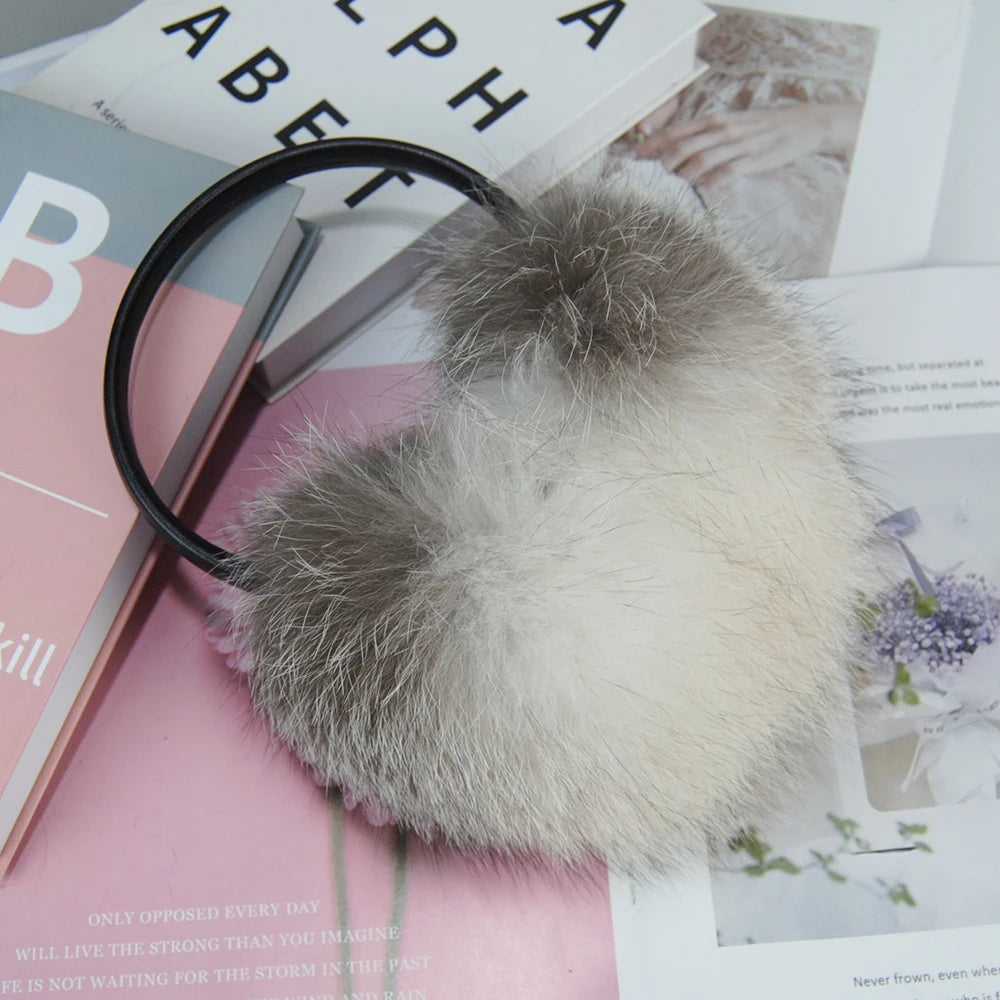 a pair of headphones sitting on top of a magazine