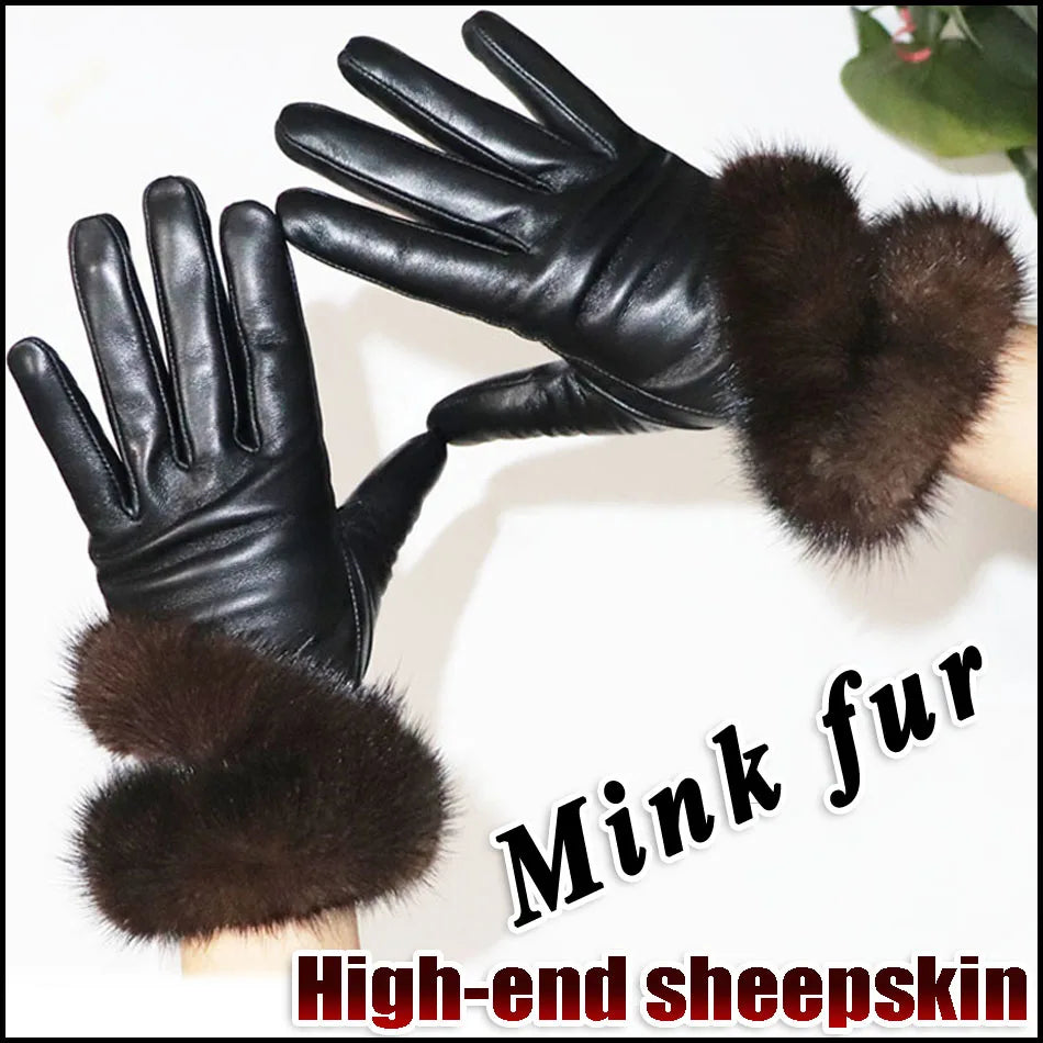 a pair of black leather gloves with fur cuffs