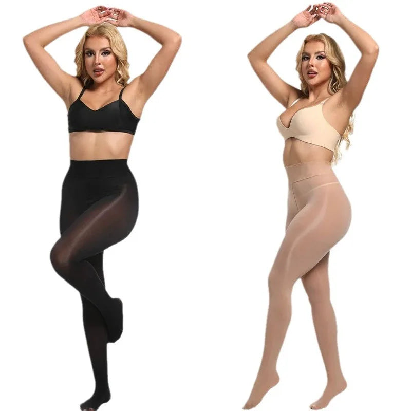 two women in black and nude bodysuits