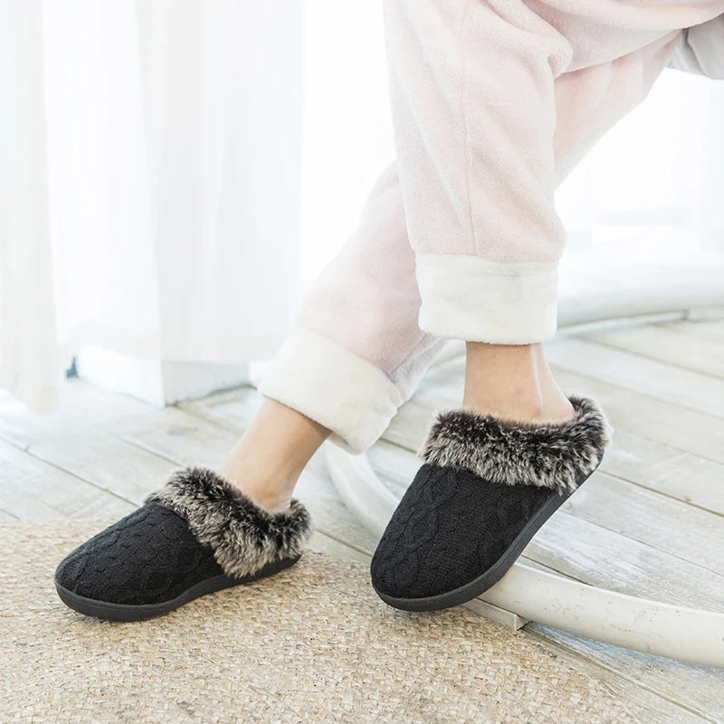 a person standing on a wooden floor wearing slippers