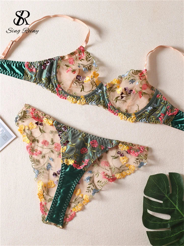 a pair of bras with flowers on them