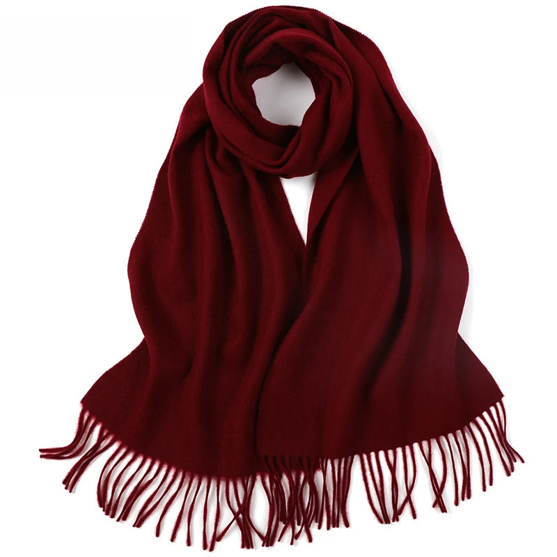 a red scarf with fringes on a white background