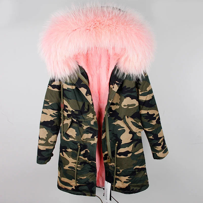 a camouflage coat with a pink fur collar