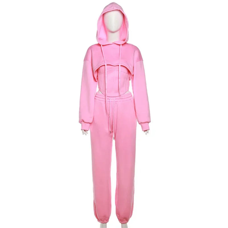 a pink jumpsuit with a hoodie on it