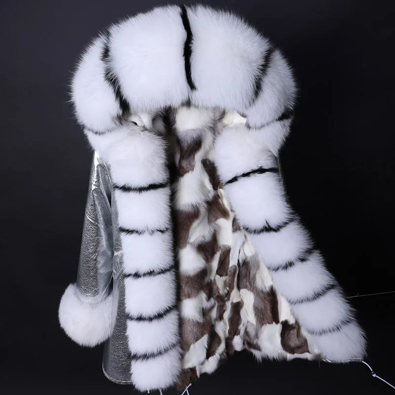 a white and brown fur coat on a black background