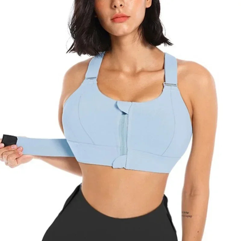 a woman wearing a blue sports bra top