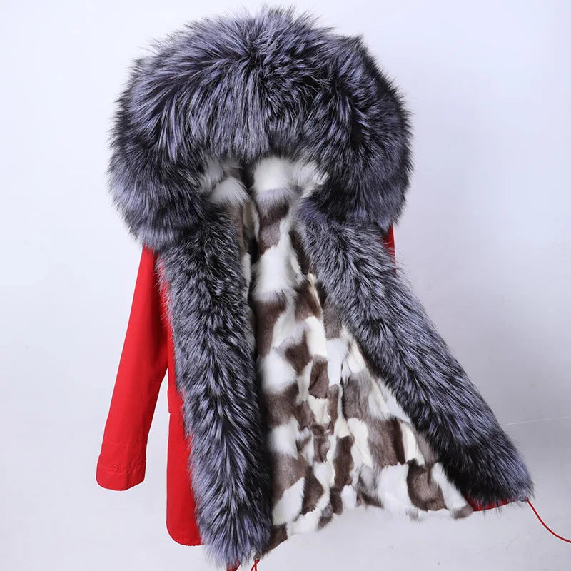 a coat with a giraffe pattern and a red hood